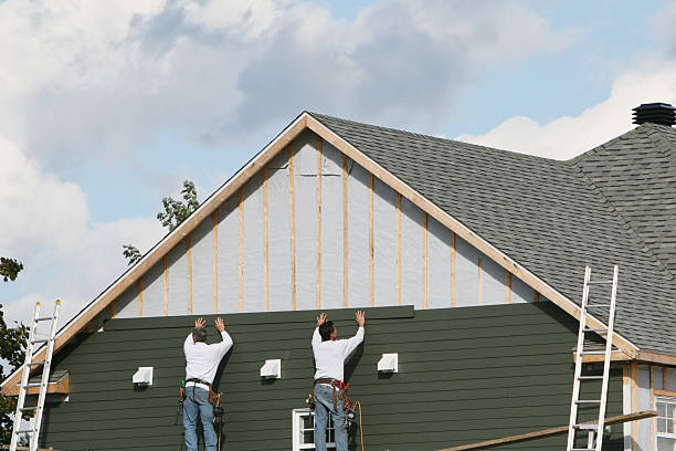 Professional Siding Contractor technician working in Bergholz, OH